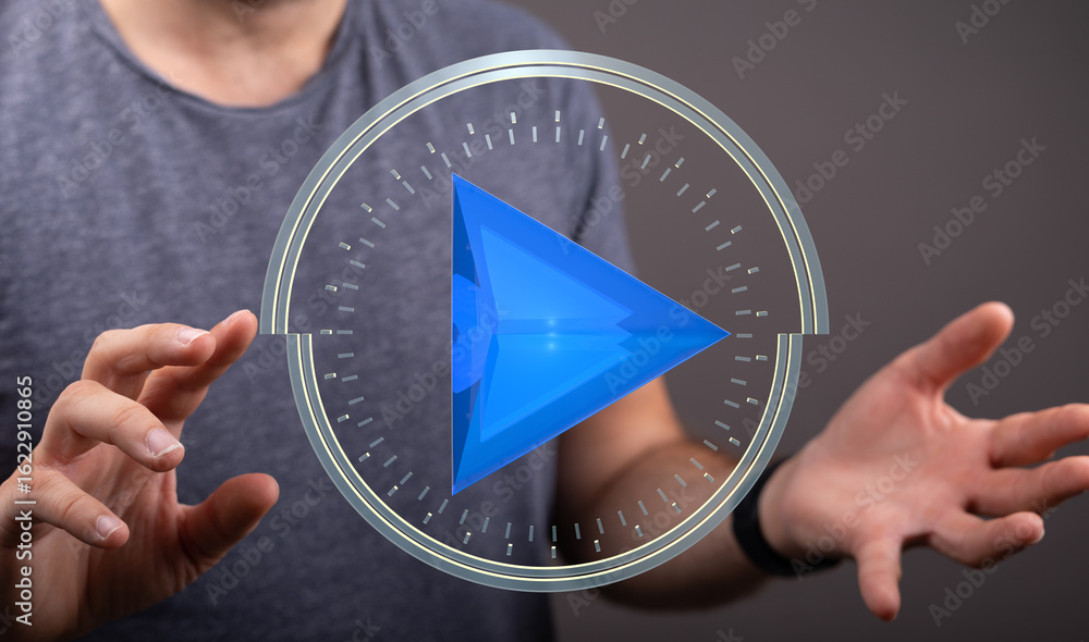 Poster close-up of hands interacting with a digital play button. modern technology concept.