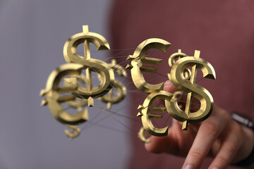 Image depicting interconnected dollar and euro symbols, representing global finance and currency...