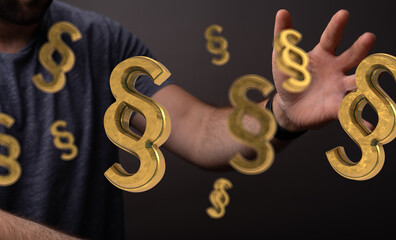 Abstract image depicting legal concepts.  Golden paragraph symbols surround a man's hand.