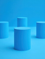 Modern product display with blue cylinders arranged in a minimalist composition on a blue background
