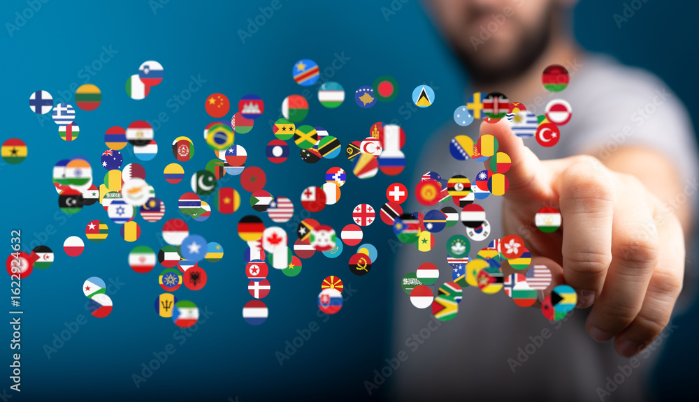 Poster a man interacts with a digital display of world flags, symbolizing global connection and internation