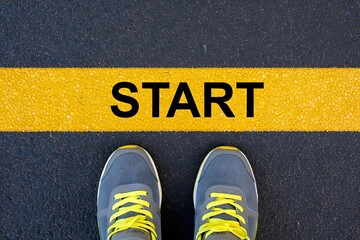 Start line concept with running shoes for motivation and beginning new journey or challenge
