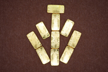Gold bars, gold color, containing 96.5 percent gold.