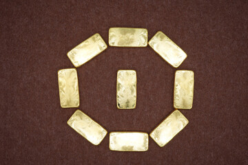 Gold bars, gold color, containing 96.5 percent gold.
