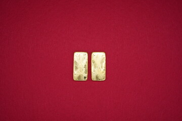 Gold bars, gold color, containing 96.5 percent gold.