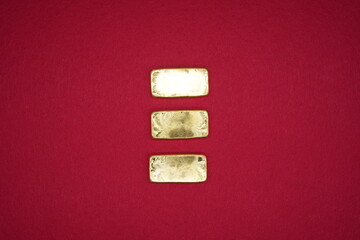 Gold bars, gold color, containing 96.5 percent gold.