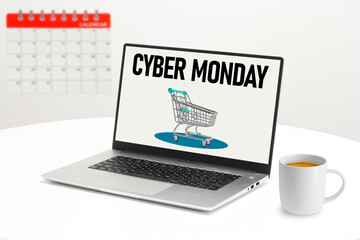 Cyber Monday Sale is shown using the text on the screen of laptop