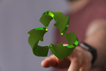 Sustainable recycling concept.  Eco-friendly 3D render of a recycle symbol.