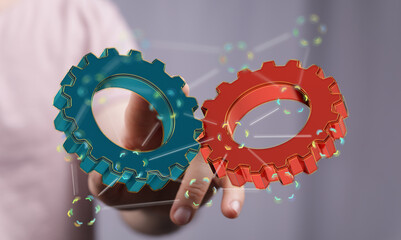 Image of two gears meshing, symbolizing teamwork, collaboration, and synergy.