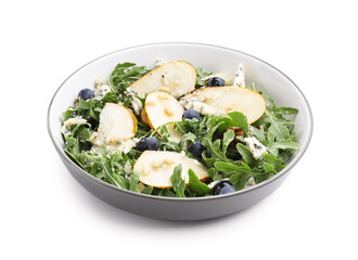 Tasty salad with arugula, pear, blue cheese, peanuts and blueberries in bowl isolated on white