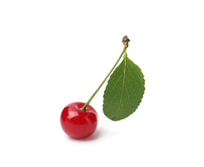 Fresh ripe cherry with green leaf isolated on white