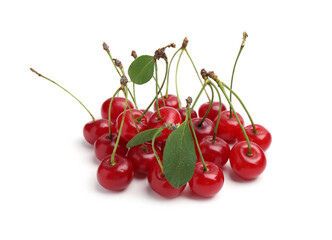 Fresh ripe cherries with green leaves isolated on white