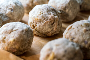 Self made bread dumplings in close up view which are as well called in Bavaria as Semmelknödel