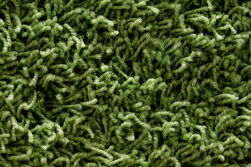 High-resolution image of green shag carpet texture. Perfect for backgrounds and design projects.
