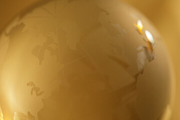 Abstract golden globe background image. Perfect for website banners, presentations, and more.