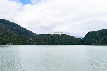 Chilean patagonia landscape showing mountains reflecting on the lake