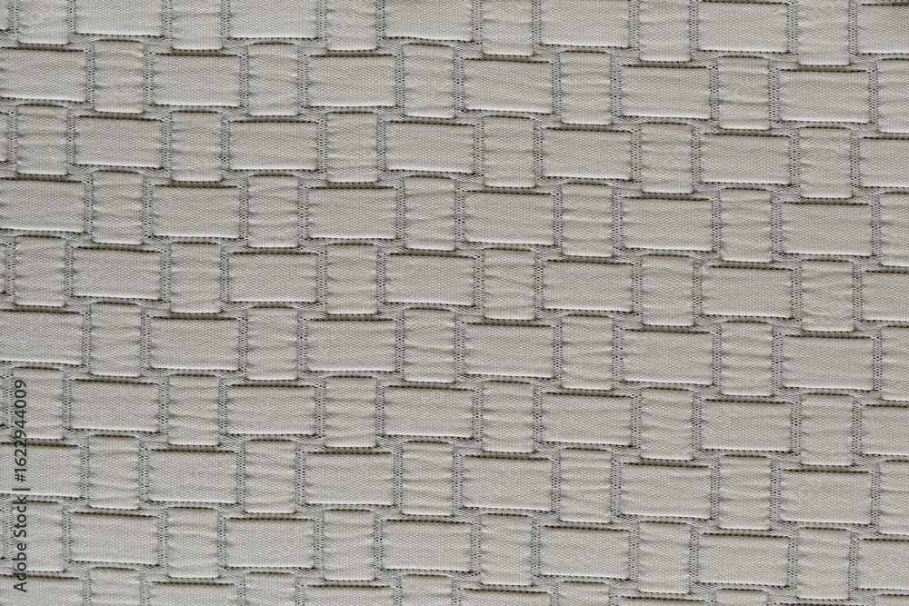 Poster high-resolution image of beige fabric with a textured pattern. perfect for background, website, or d