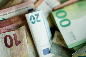 Close-up of various euro banknotes.  Ideal for finance, banking, and economic concepts.