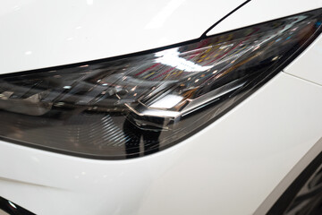 High performance LED headlight in modern design on the new car. Technology vehicle equipment...