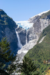 Ventisquero colgante waterfall cascading from hanging glacier in queulat national park, chile patagonia
