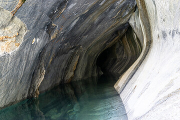 Marble caves reflecting on turquoise water in chile patagonia