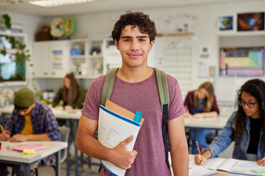Portrait of smiling latin student at high school