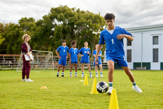 Soccer player drill practice during gymnastics class at campus