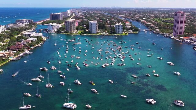 4k Aerial Footage of Boca Raton, Florida. Lagoon, Boats, Mansions, Resort, and Waterfront Condos Partial Orbit. 