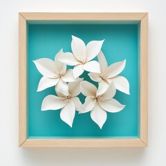 Delicate white flowers arranged in a circle, framed by light wood.
