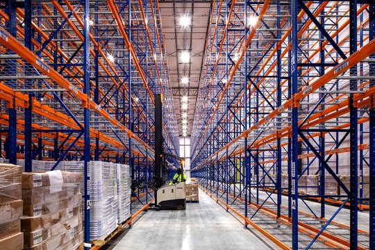 Interior of modern warehouse with empty racking system design for cold storage