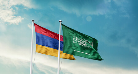 Armenia and Saudi Arabia friendship flags are waving in the sky. Two country flag for agreement or...