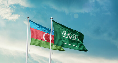 Azerbaijan and Saudi Arabia friendship flags are waving in the sky. Two country flag for agreement or deal. Azerbaijan KSA national flag for commitment.