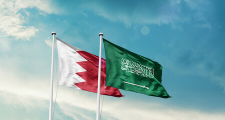 Pakistan and Saudi Arabia friendship flags are waving in the sky. Two country flag for agreement or deal. Pakistan KSA national flag for commitment.