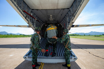Paratroopers Boarding, Soldiers boarding a transport aircraft, preparing for an airborne training...
