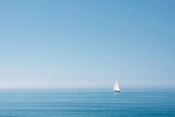 Obraz premium Calm ocean with solitary sailboat, creating serene atmosphere un