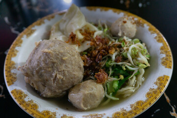 Bowl of Indonesian Meatball Soup with Vegetables