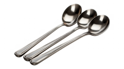 Three metal spoons arranged in a diagonal line on a white background