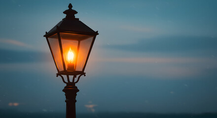 The warm glow of a vintage street lamp illuminates the twilight sky, casting a soft, inviting light on the quiet, peaceful night.