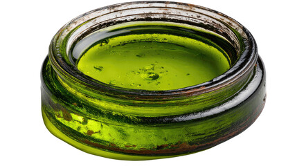 Vibrant Green Tea in Glass Jar: A macro view showcases a small glass jar filled with vivid green tea.