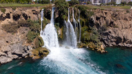 Waterfall Duden (Karpuzkaldiran selalesi) falling into the Mediterranean sea. Waterfall falling...