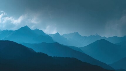 Serene Mountain Landscape Under Dramatic Gray Skies at Dusk
