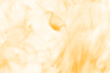 Intense abstract depiction of vibrant orange and yellow flames dancing and swirling in a dark fiery background evoking heat and energy