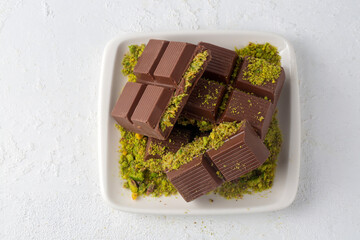 Dubai chocolate, milk chocolate filled with pistachio paste and kunefe
