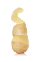 Raw potato with peel isolated on white