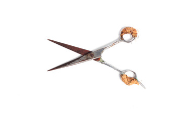 rusty barber scissors wrapped in gauze isolated on white background