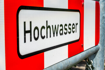 Fototapeta premium typical highwater sign in germany - translation: high water