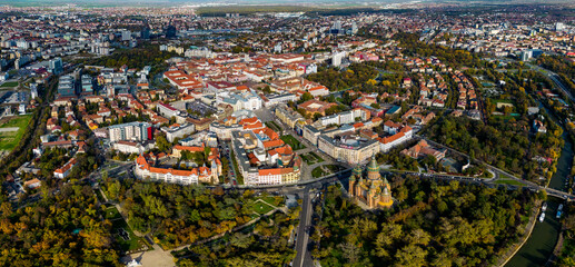 Aerial view of the city Timișoara in Romania on a sunny noon in autumn.	
