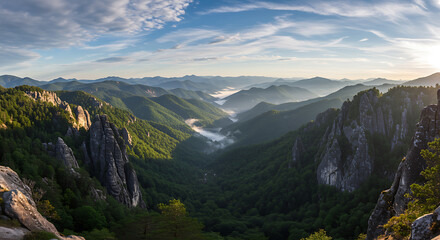 Obraz premium Breathtaking mountain landscape with morning mist offering a serene and peaceful feeling of escape