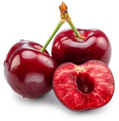 Sweet cherries and half of pitted cherry isolated on white background. Cut out PNG file.