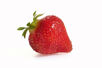 Fresh Strawberry. A vibrant red strawberry on an isolated white background